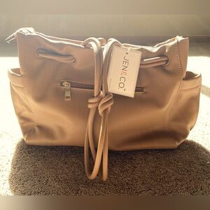 NEW 
KEN & CO. Vegan purse!
Designed in the USA